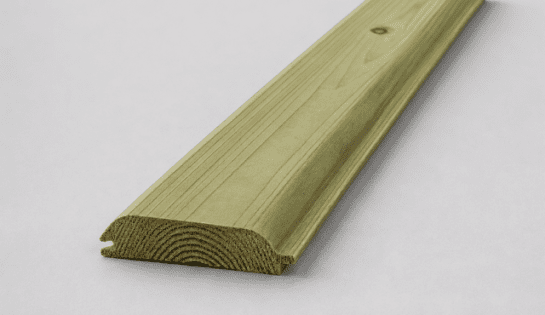 Long wooden decking plank with a tongue-and-groove groove along the edge, resting on a light surface.