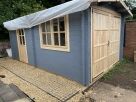 Matchboard cladding in garden painted blue
